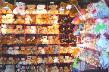 ms teddy bear shows with many stuffed animals
